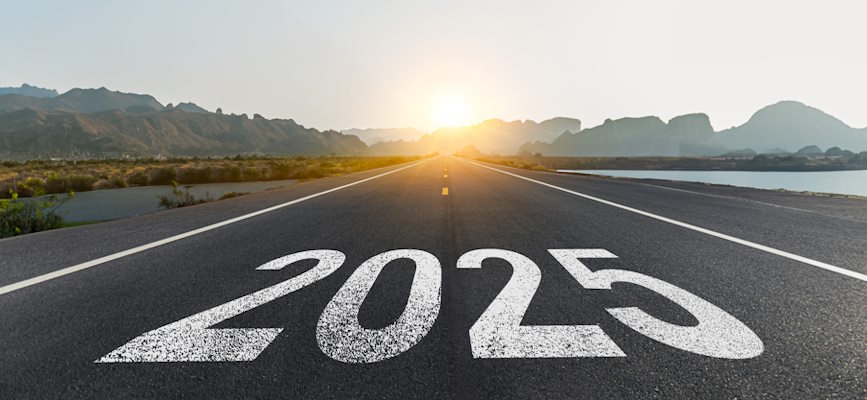 Concept image of a 2025 painted on a road headed for a sunrise as a concept image for 2025 media trends