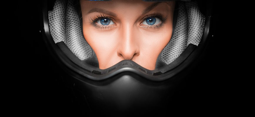Closeup of helmeted female athlete's eyes to demonstrate a focus on niche streaming sports