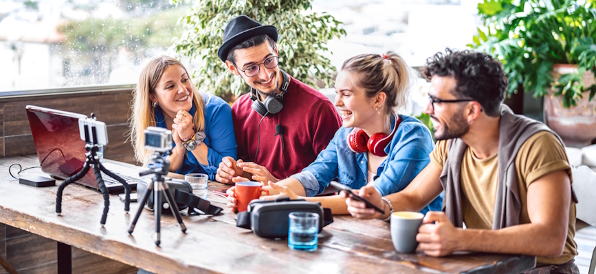A group of Gen Z people creating news content