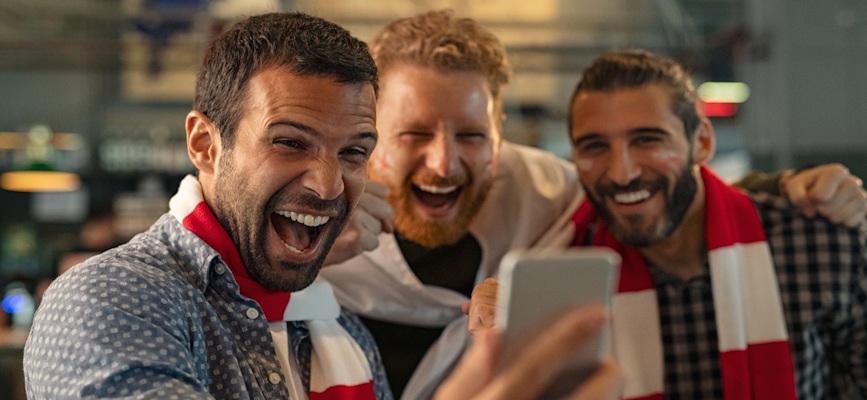 ---cheering fans enjoying live sports streaming ---